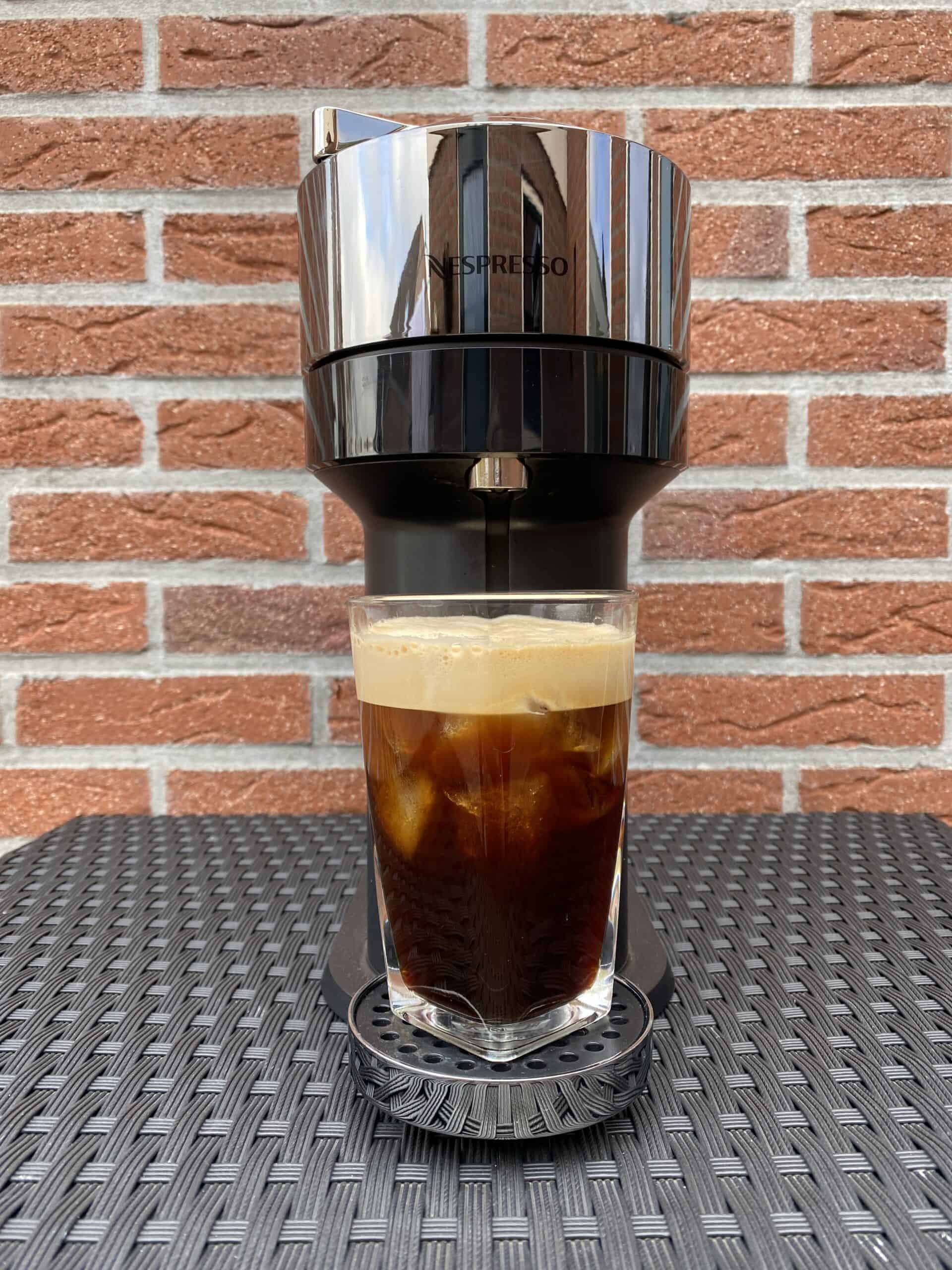 Nespresso Vertuo machine with iced coffee in the front.