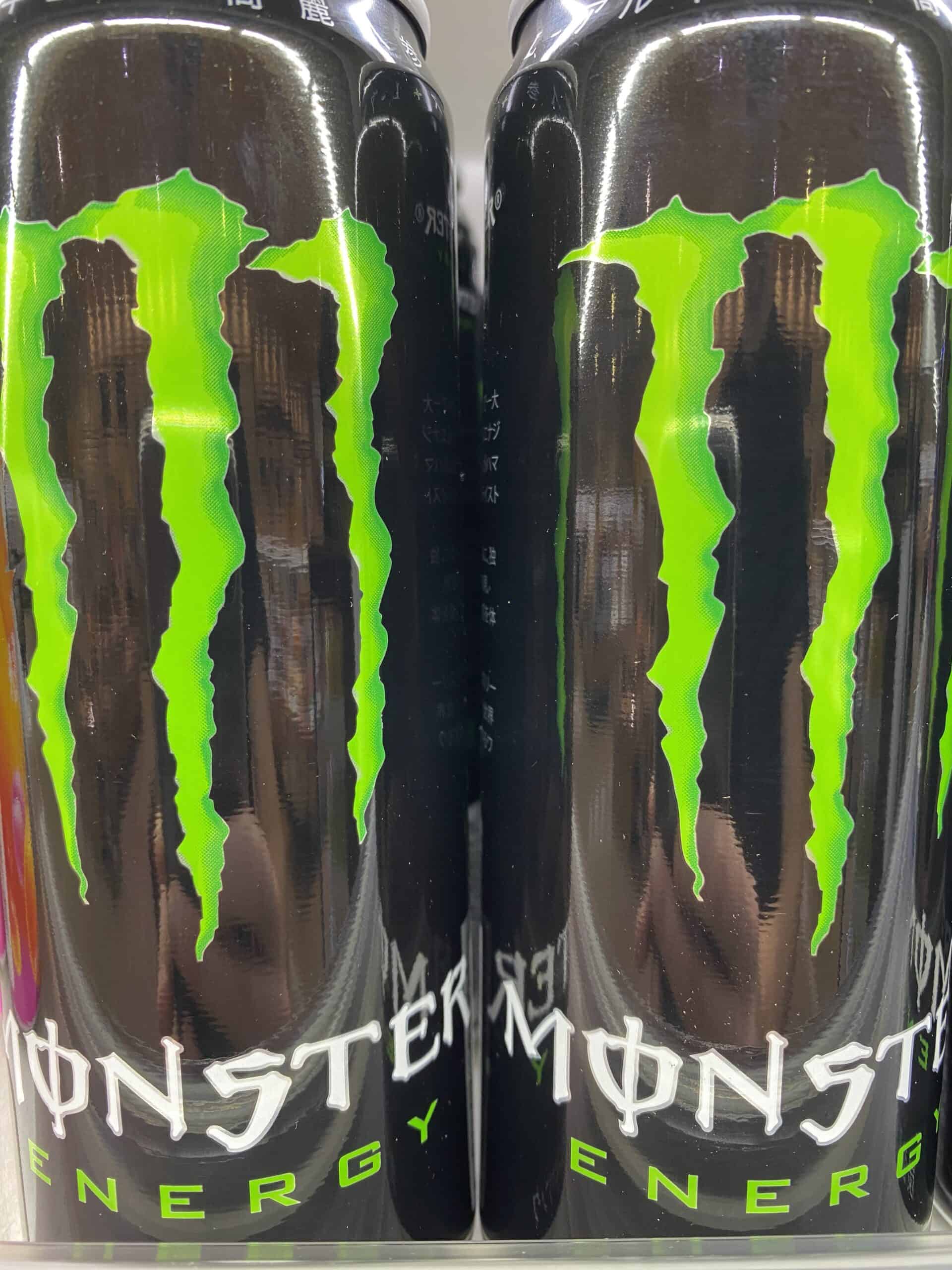 Monster Energy drinks next to each other.