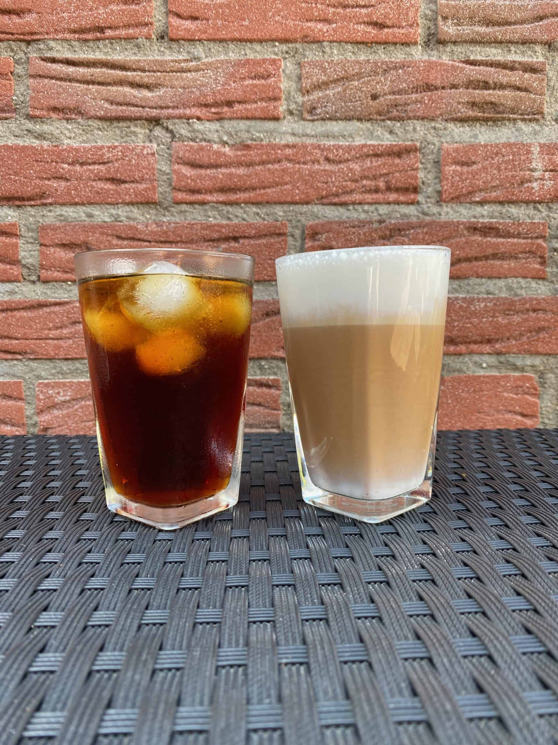 A side-by-side comparison between a cold brew and a latte.